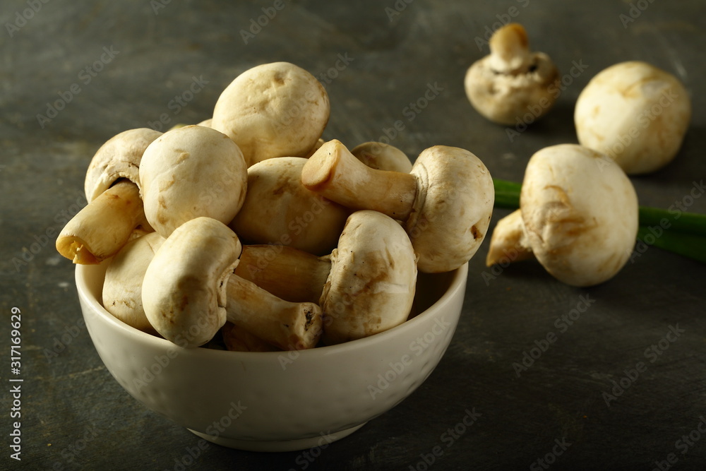 Bowl of organic button mushrooms Bowl of organic button mushrooms