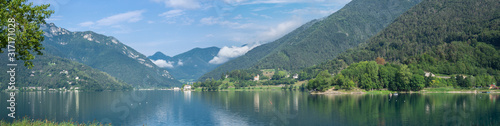 Ledro, Italy. The Ledro lake is a natural alpine lake. Amazing turquoise, green and blue colors. Italian Alps. Touristic destination. Summer time
