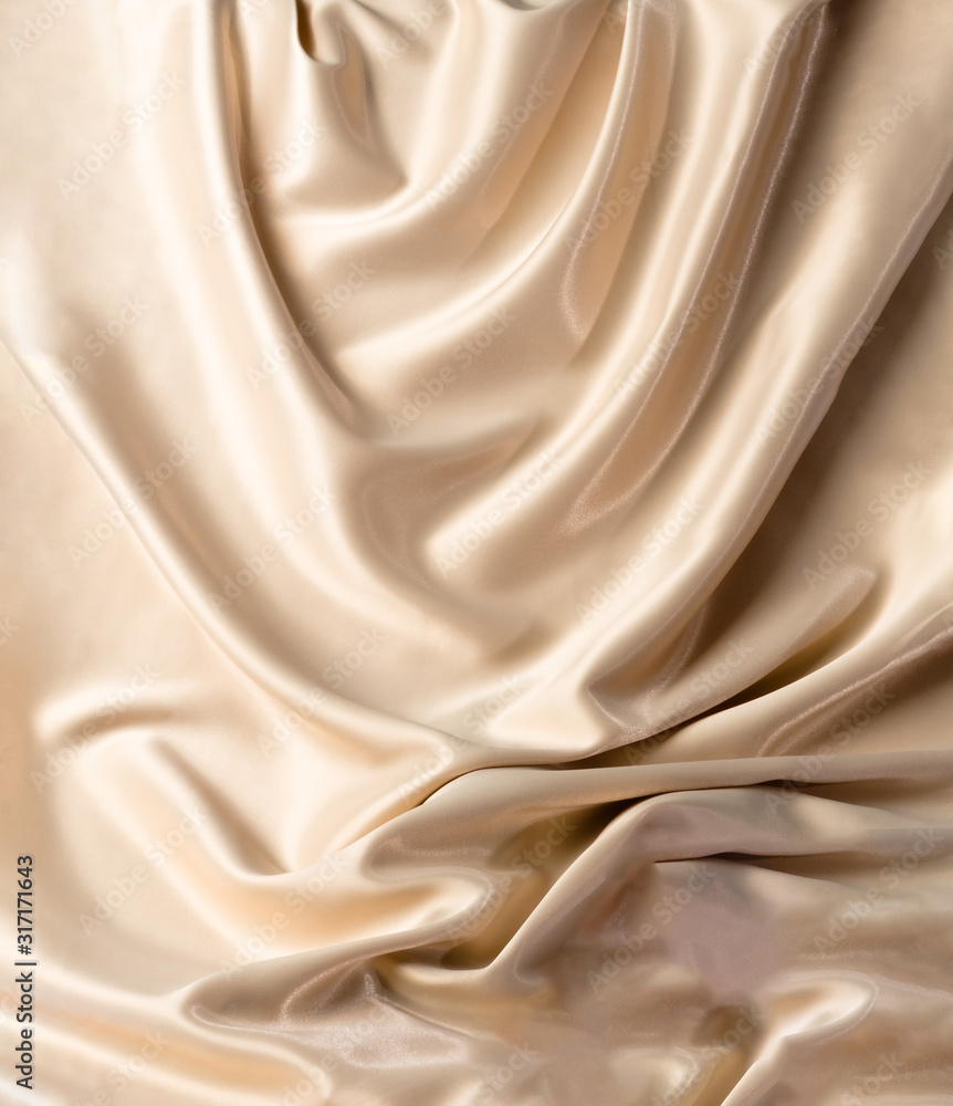 Abstract white wavy textile silk background with milky, creamy, champagne color Abstract white wavy textile silk background with milky, creamy, champagne color