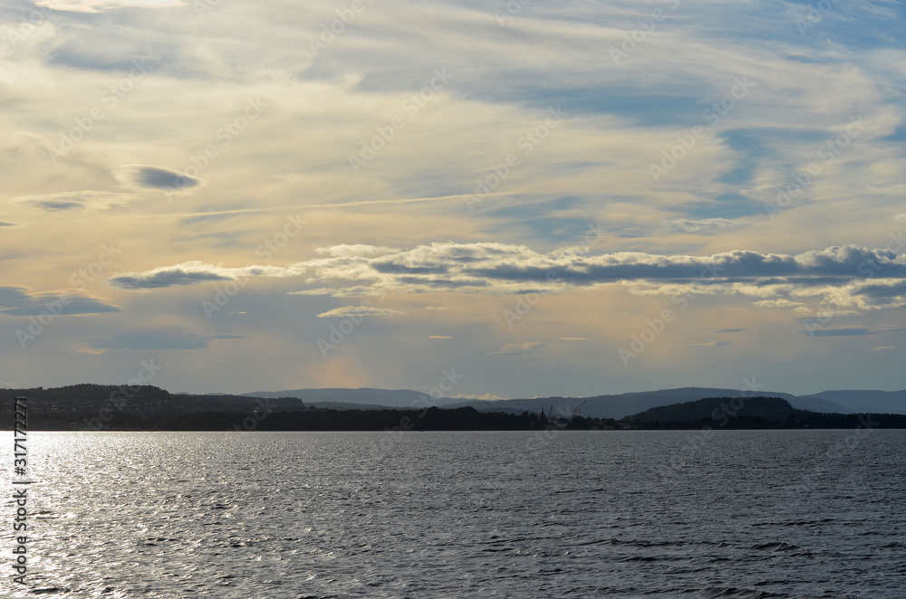 Oslofjord. View of the North Sea from Ferry from Horten to Moss connects Ostfold and Vestfold in Norway. Ferry crossing Oslofjord Oslofjord. View of the North Sea from Ferry from Horten to Moss connects Ostfold and Vestfold in Norway. Ferry crossing Oslofjord