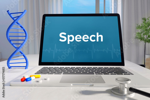 Speech – Medicine/health. Computer in the office with term on the screen. Science/healthcare