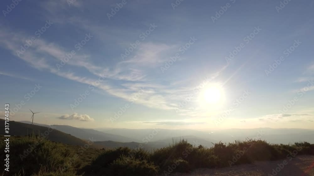 eolic turbine wind renewable energy farm on top of mountain 4k eolic turbine wind renewable energy farm on top of mountain 4k