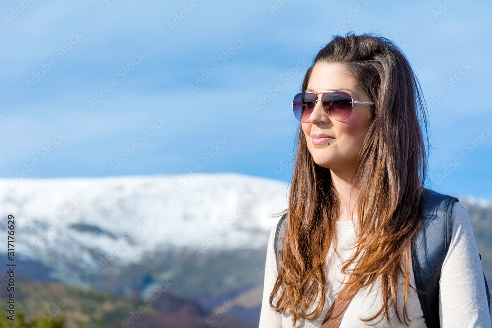 Woman in the High Snowy Mountain .Winter Vacation Concept Woman in the High Snowy Mountain .Winter Vacation Concept