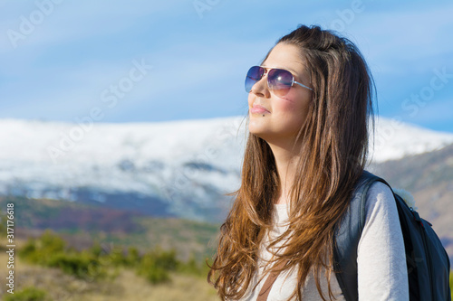 Woman in the High Snowy Mountain .Winter Vacation Concept  © boryanam
