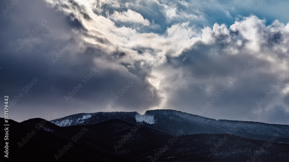 Dramatic cloud over a mountain range