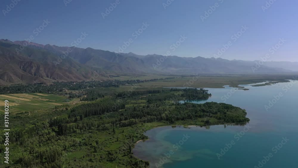 Wild beach on the shore of lake Issyk Kul 1607 m. Wild beach on the shore of lake Issyk Kul 1607 m.