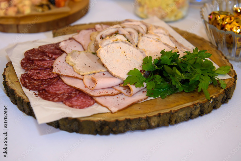 Cold Appetizers with a variety of food on the table. Gorging on calories at a holiday reception.