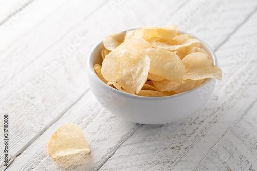 Potato chips heaping in a bowl