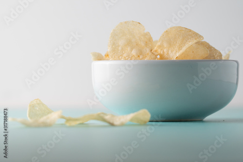 Potato chips heaping in a bowl