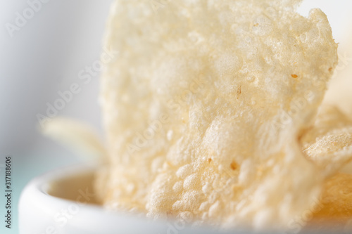 Super close up of a potato chip.