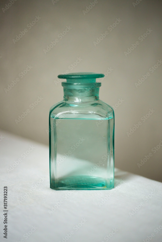 Glass square bottle. Glass square bottle.