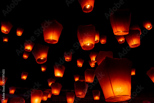 Orange lanterns at Pingsi sky lantern festival, Taiwan photo