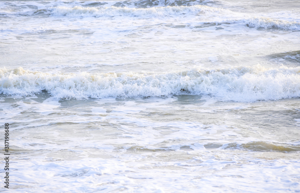 The sea in the dark blue sky on the day of bright