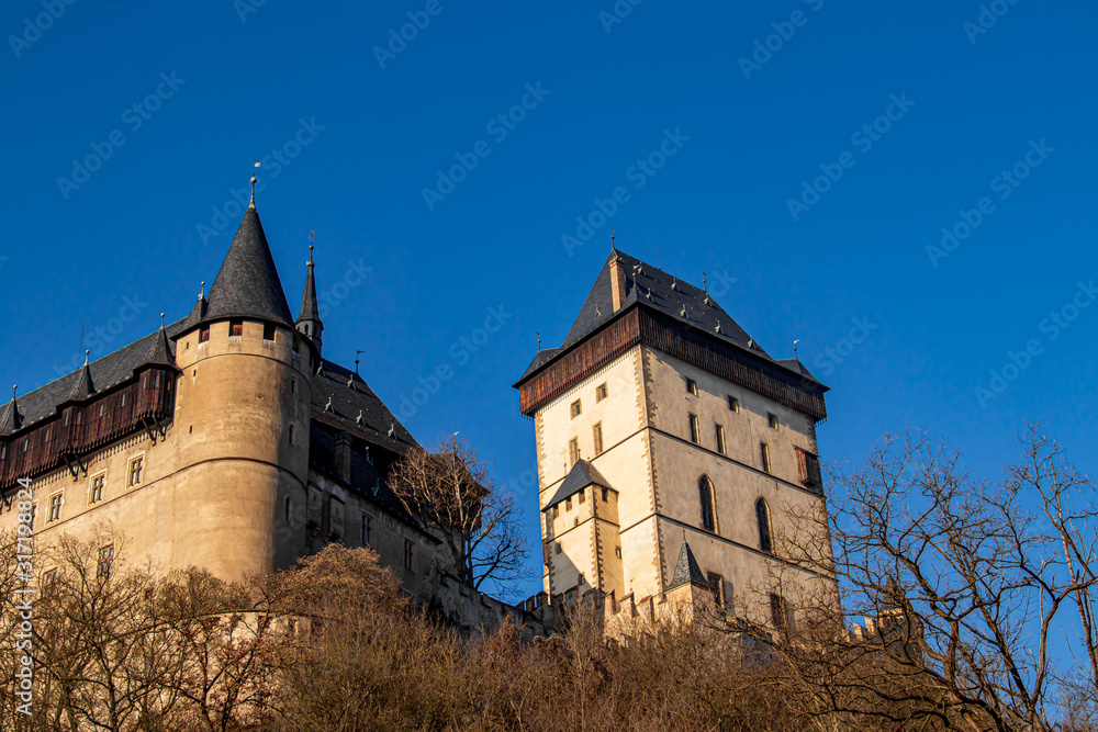 High walls and towers of Karlstejn castle High walls and towers of Karlstejn castle