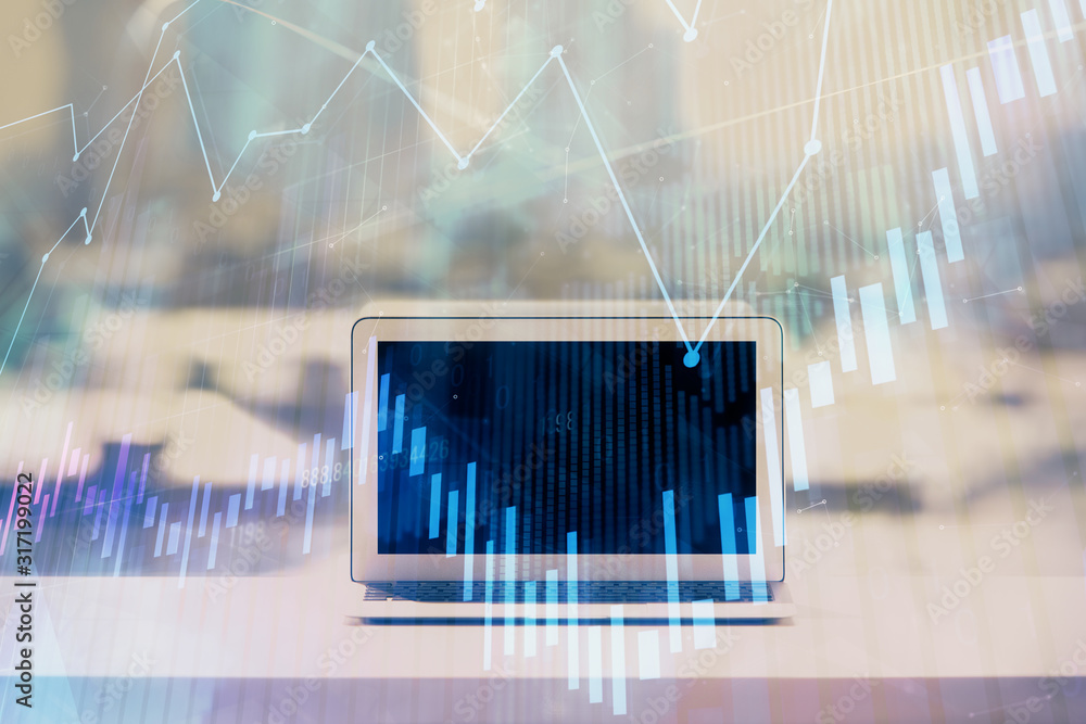 Forex graph hologram on table with computer background. Multi exposure. Concept of financial markets. Forex graph hologram on table with computer background. Multi exposure. Concept of financial markets.