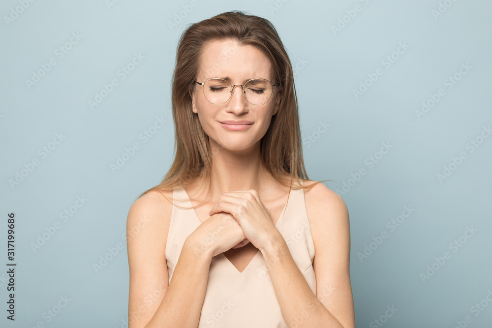 Unhappy young woman in glasses crying feeling desperate Unhappy young woman in glasses crying feeling desperate