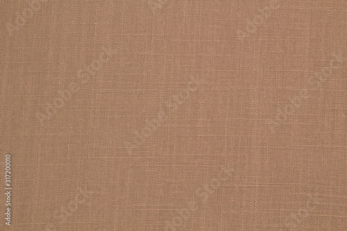 Fabric linen suit fold top view. Pink color textile
