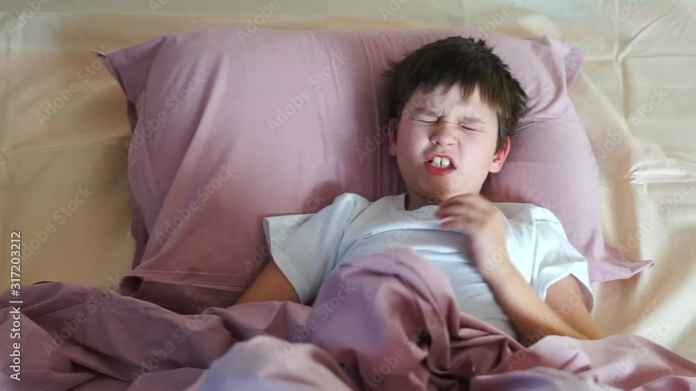 male child does not want to wake up. cute male child covers with blanket. angry unhappy kid refuse waking up. bad morning. quarantine time. home isolation from virus male child does not want to wake up. cute male child covers with blanket. angry unhappy kid refuse waking up. bad morning. quarantine time. home isolation from virus