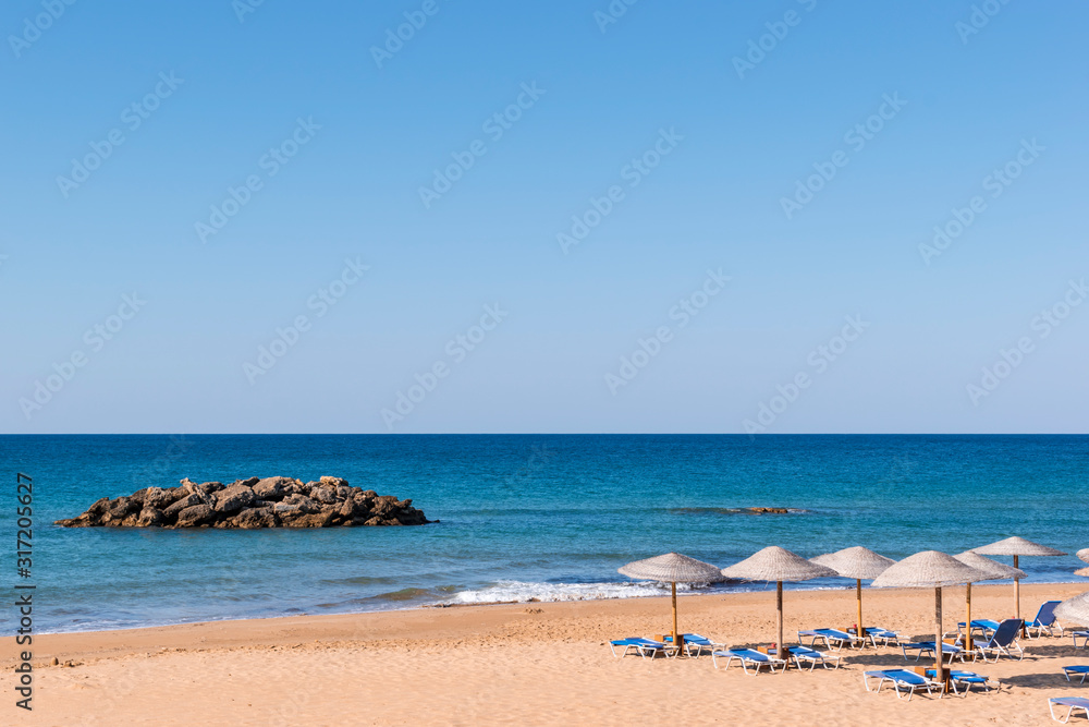 Chalikounas Beach, Corfu Island. View of the deserted, sandy, windy beach on the western part of Corfu. Seascape. Travel and vacation concept.