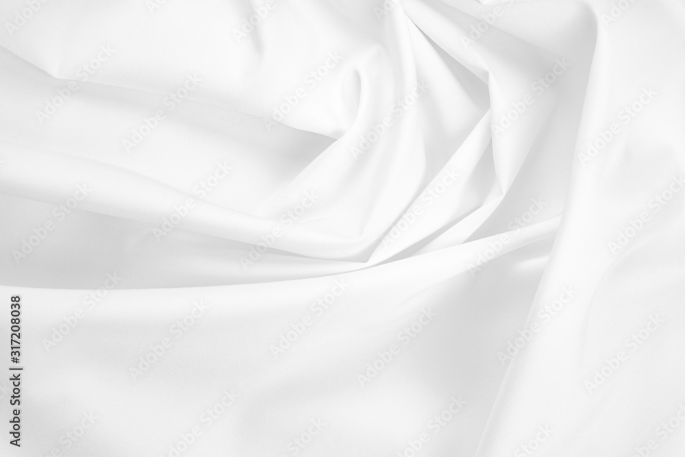 Fototapeta premium Abstract white fabric texture background. Cloth soft wave. Creases of satin, silk, and cotton.