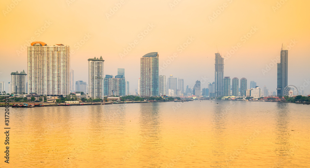 Bangkopk skyline, view of the city with reflection on the Chao Praya River, Thailand