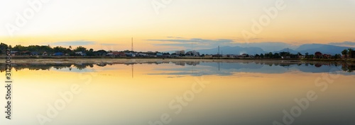 Panoramic beautiful lake of Nong Bueng Kan Public Park with City at Bueng Kan province, Thailand. photo