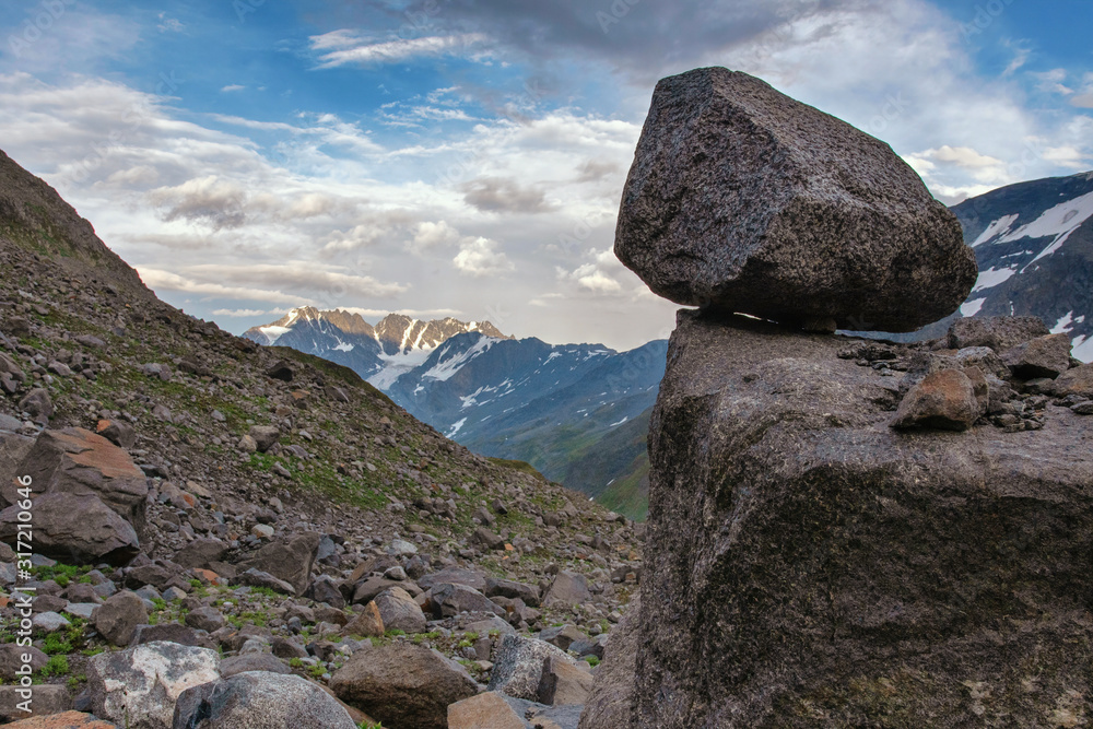 Summer mountainous landscape with a boulder. Summer mountainous landscape with a boulder.