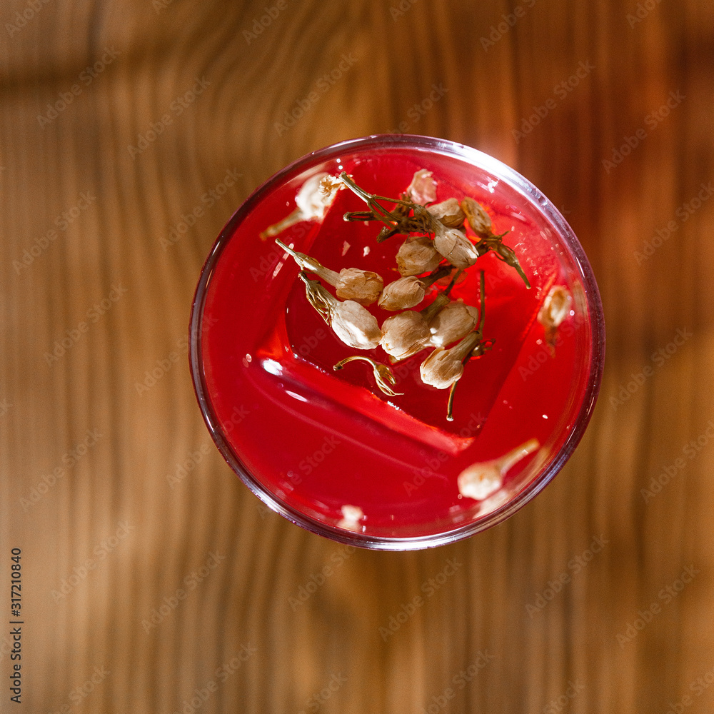 Top view of cocktail served on the wooden bar desk. Top view of cocktail served on the wooden bar desk.