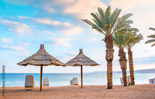 Morning on central public beach of Eilat - famous tourist resort and recreational city in Israel and Middle East