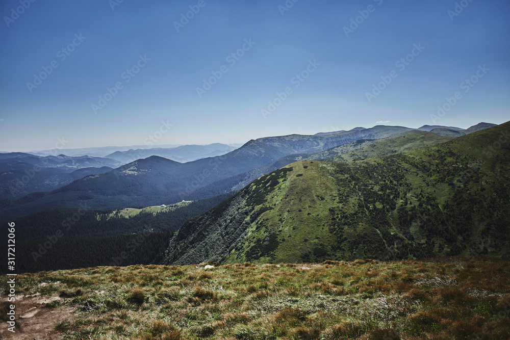 Picturesque landscape of mountains and blue sky