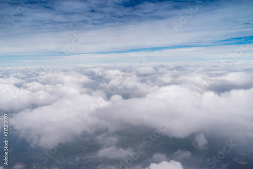 Big Blue sky and Cloud Top view from airplane window,Nature background © gjp311