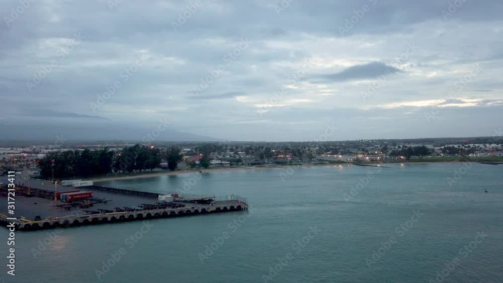 Cityscape from cruise ship in Maui, Hawaii. Kahului Harbor is located on Maui's north central coast. Kahului Harbor is primarily a commercial harbor and port. Cityscape from cruise ship in Maui, Hawaii. Kahului Harbor is located on Maui's north central coast. Kahului Harbor is primarily a commercial harbor and port.