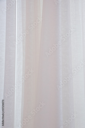 white curtain lay on window