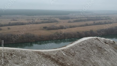 Cretaceous mountains in late autumn. Hiking and flying over the mountains.