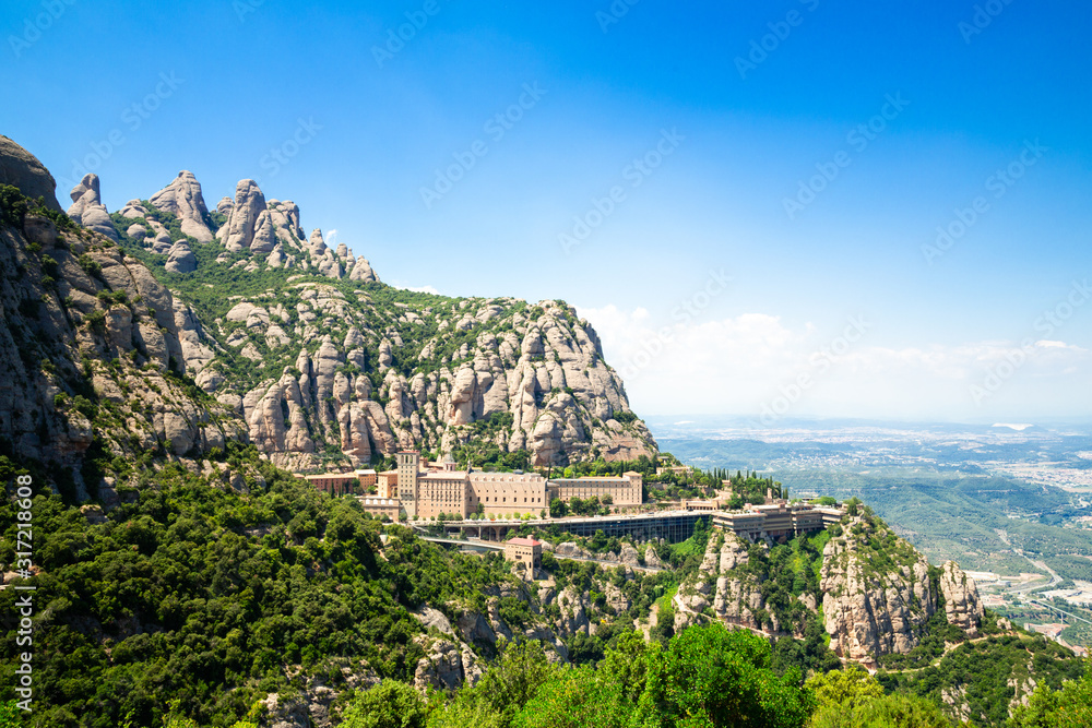 Obraz premium Panoramic views of the mountains and Montserrat Monastery, Catalonia, Barcelona, Spain. Beautiful landscape