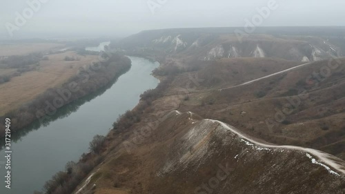 Cretaceous mountains in late autumn. Hiking and flying over the mountains.