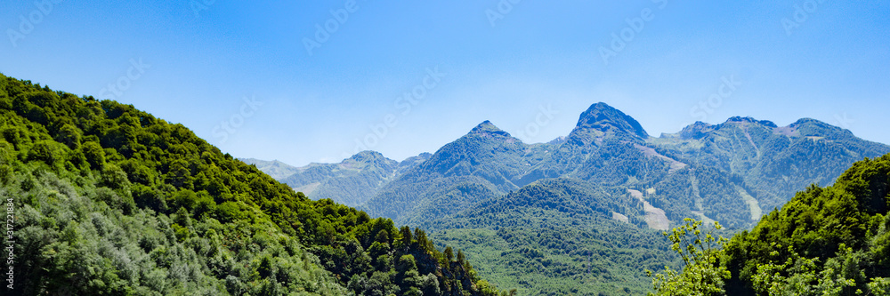 Panoramic view mountain range in the summer. Panoramic view mountain range in the summer.