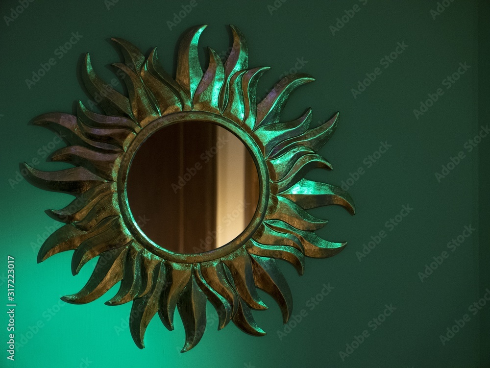 Round Sun Shaped Mirror On A Blue Wall, Round Sun Shape Mirror