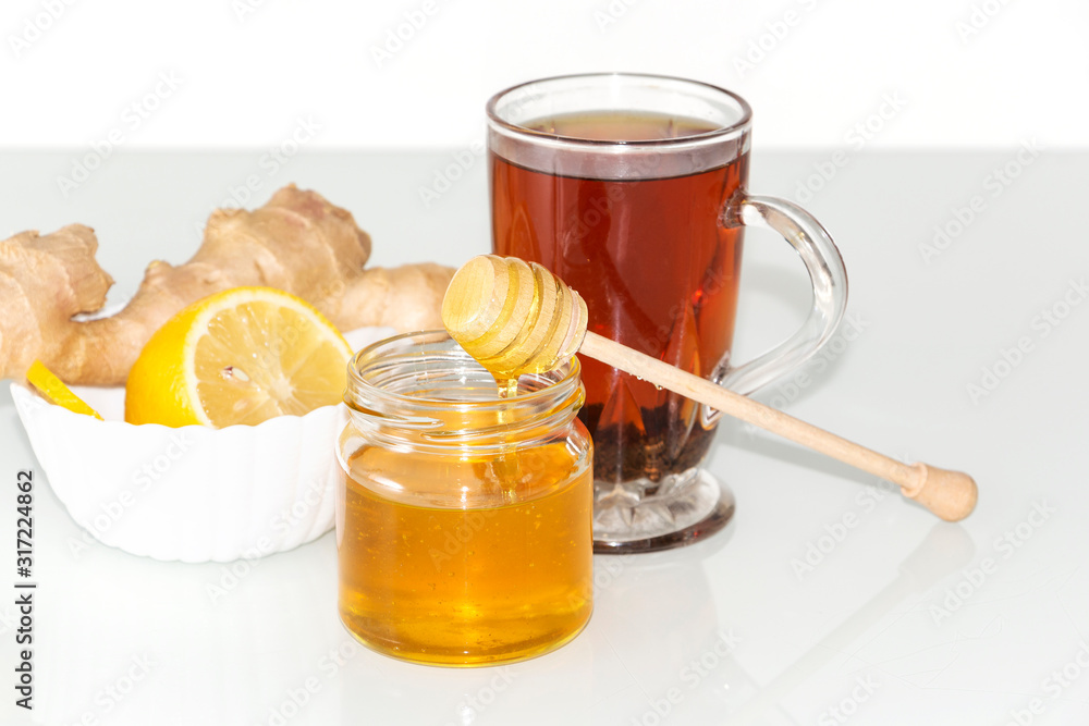 Tea with lemon and honey. Honey and ginger. Tea with lemon and honey. Honey and ginger.
