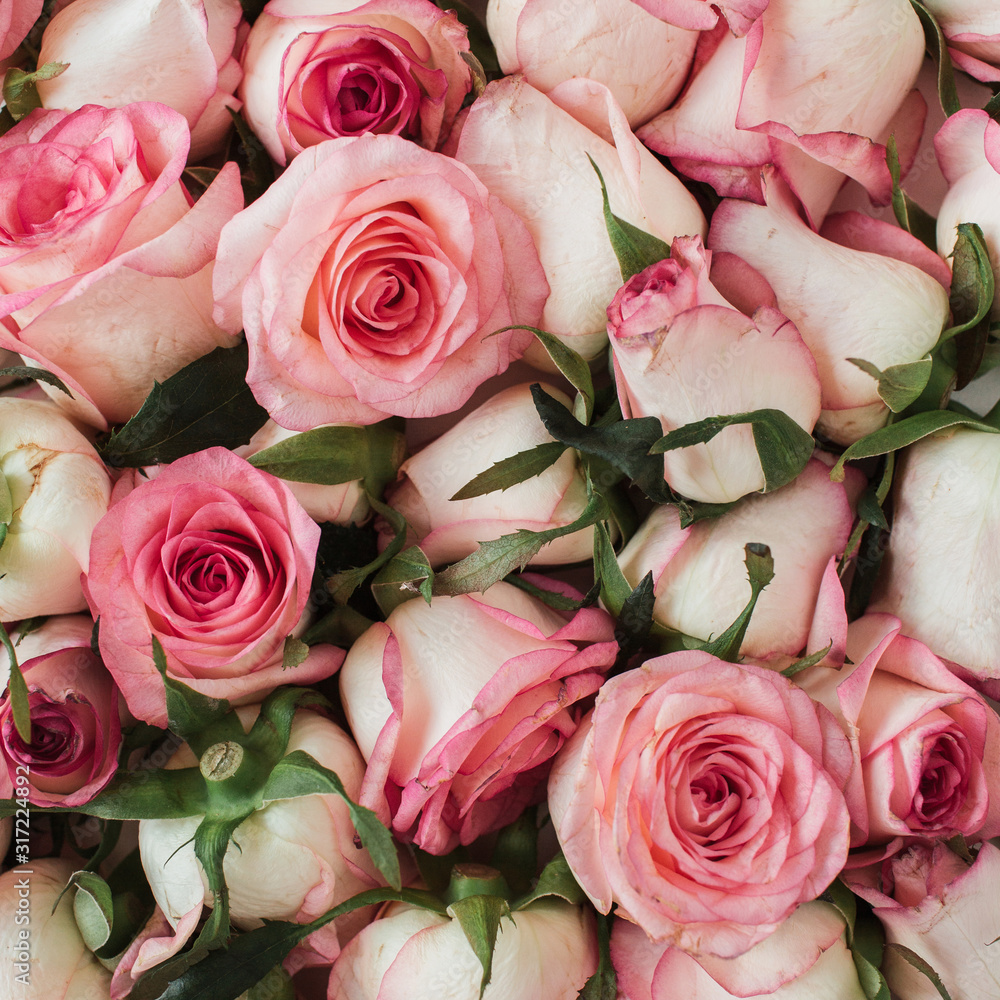 Floral composition with pink rose flowers pattern texture background. Flatlay, top view. Floral composition with pink rose flowers pattern texture background. Flatlay, top view.