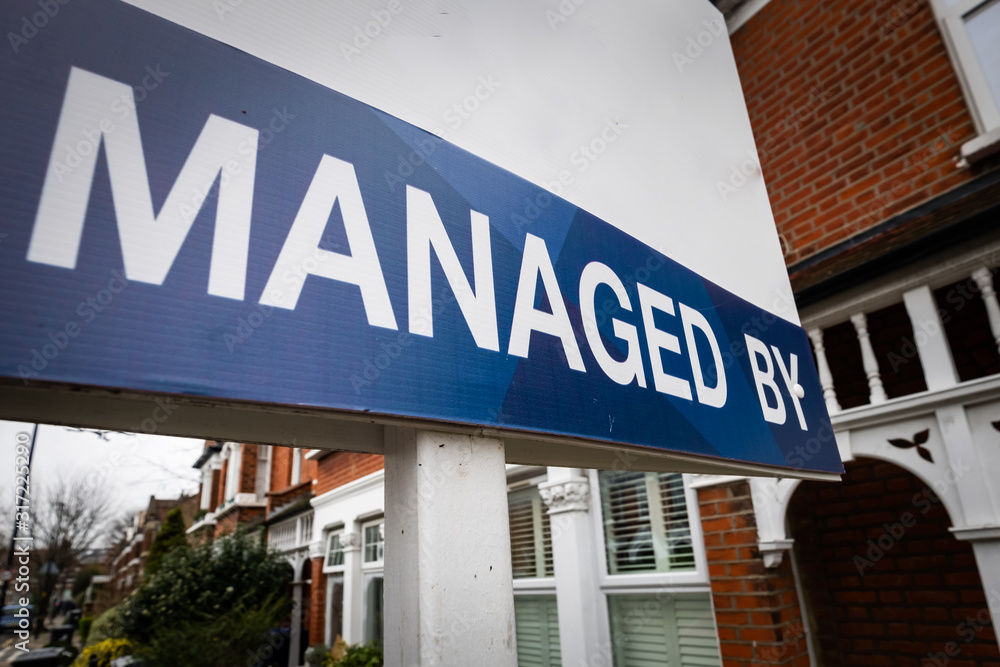 Property management company 'Managed by' sign board Property management company 'Managed by' sign board