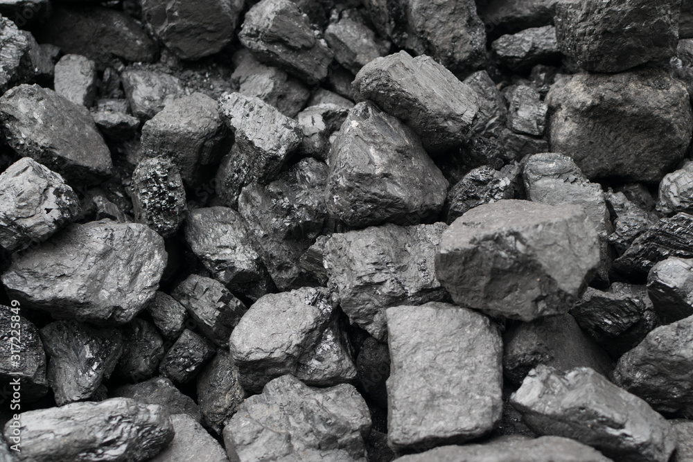 Pile of natural black hard coal or diamond coal background Pile of natural black hard coal or diamond coal background