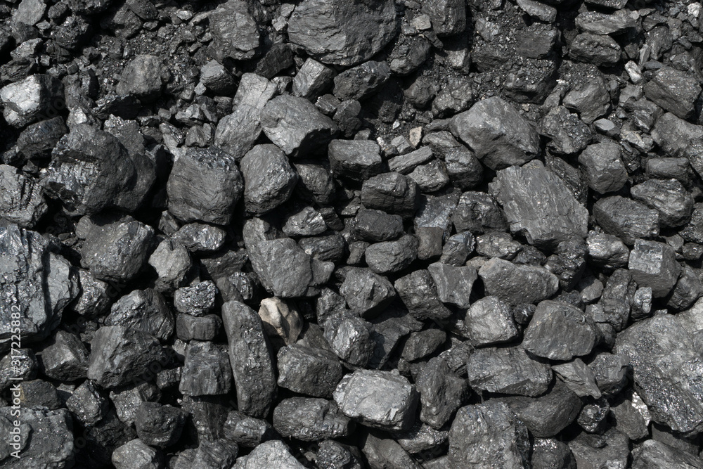 Pile of natural black hard coal or diamond coal background Pile of natural black hard coal or diamond coal background