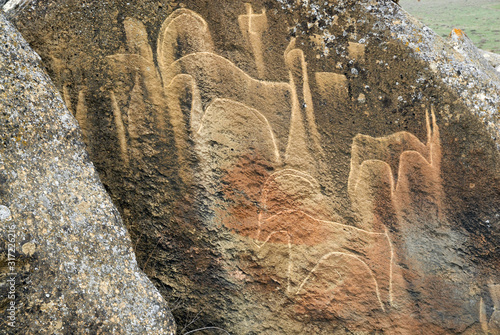 Goats. Prehistoric Petroglyphs (rock painting) are included in UNESCO World Heritage List. Gobustan National Park, Azerbaijan, Caucasus. photo