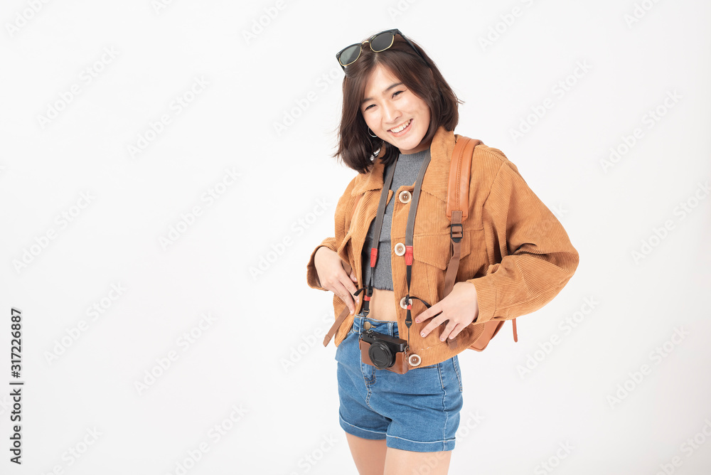 Beautiful young asian tourist woman happy on white background studio Beautiful young asian tourist woman happy on white background studio