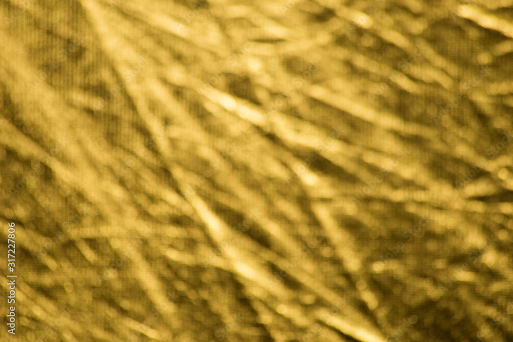 An abstract golden yellow bokeh background An abstract golden yellow bokeh background