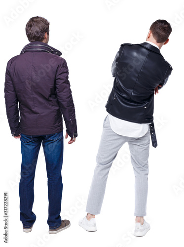 Back view of couple in winter jacket.