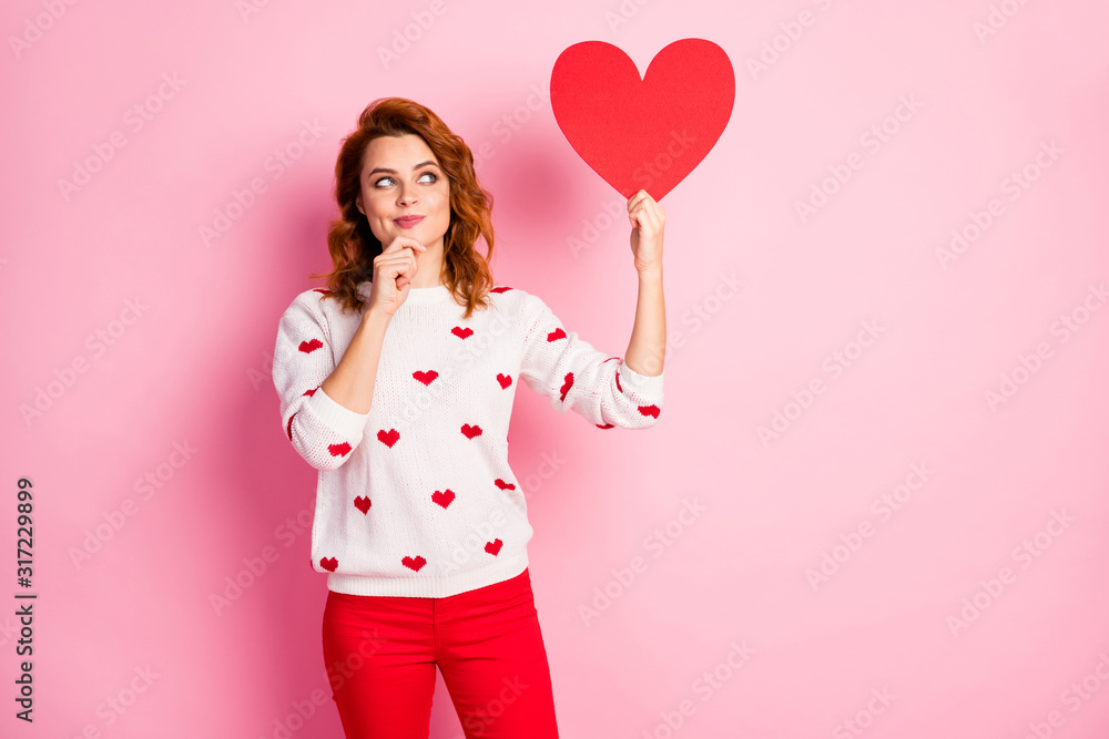 Portrait of her she nice attractive lovely cheerful curious creative wavy-haired girl wearing white pullover holding in hands large heart creating strategy isolated on pink pastel color background Portrait of her she nice attractive lovely cheerful curious creative wavy-haired girl wearing white pullover holding in hands large heart creating strategy isolated on pink pastel color background