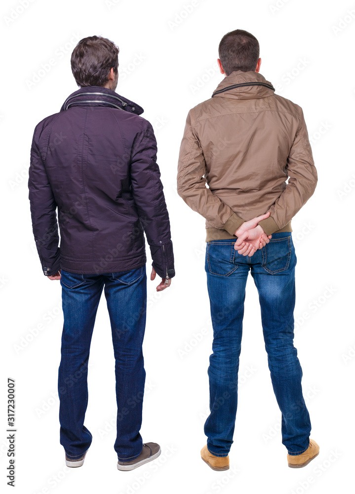 Back view of couple in winter jacket. Back view of couple in winter jacket.