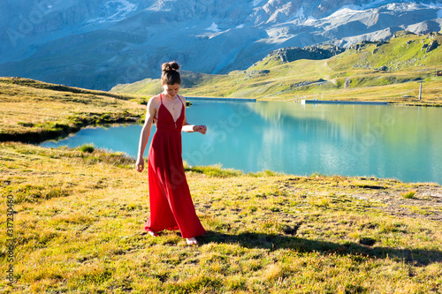 Young girl dancing in the mountains